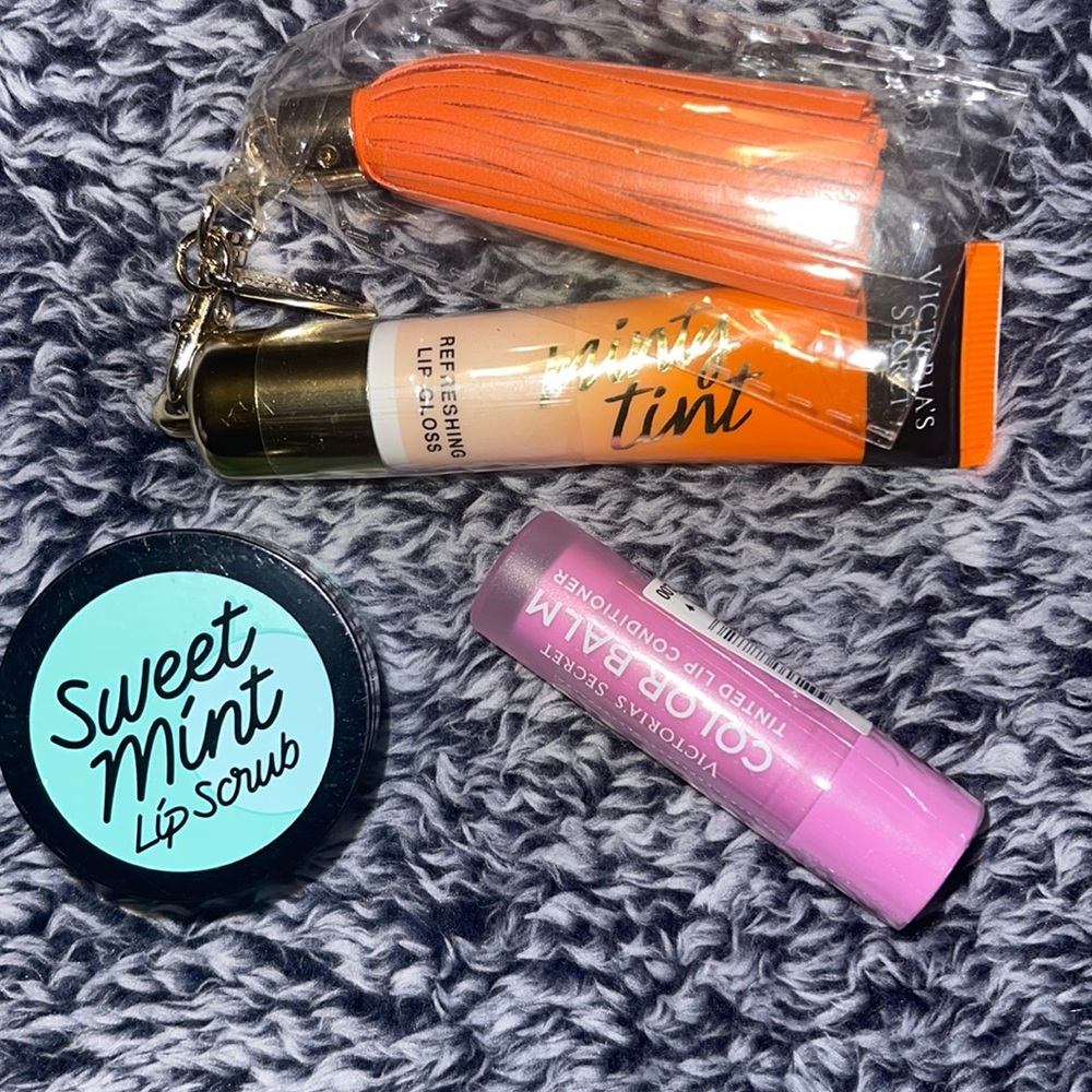 Victoria’s Secret lip gloss tinted lip shine, and VS pink lip scrub